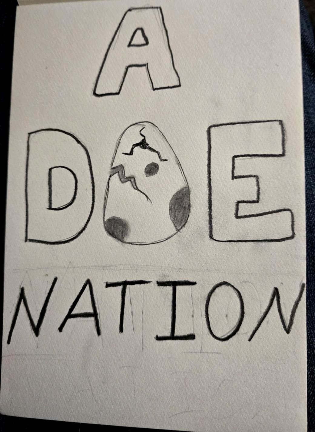 Hand-drawn pencil sketch of the words A DOE NATION, with the O drawn as a cracked, hatching egg.
